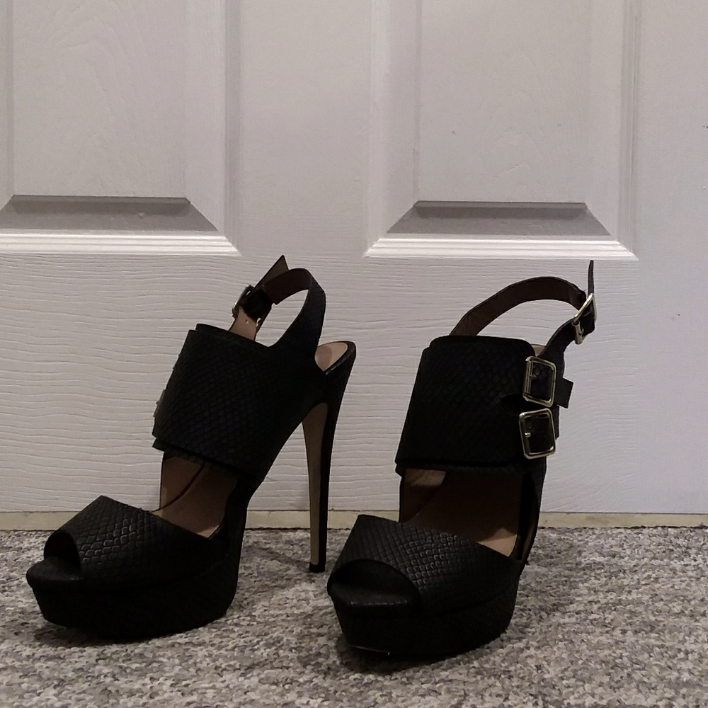 Unusual sling back platform stiletto heels